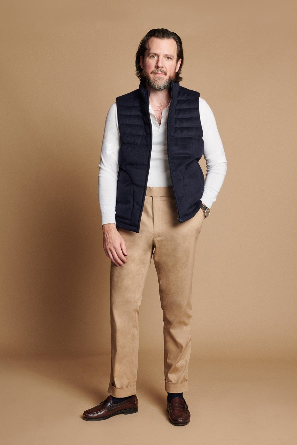 dress shirt with puffer vest How to Wear a Puffer Vest Beyond the Outdoors